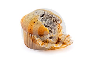 Blueberry muffin with a missing bite over white