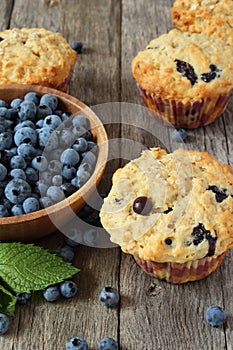 Blueberry muffins on wooden board
