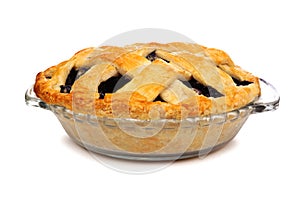 Blueberry pie with lattice pastry isolated on white