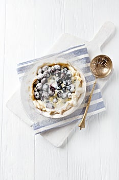 Blueberry Quiche ina Ceramic Dish on white wooden background