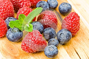Blueberry, ruspberry and mint leaves
