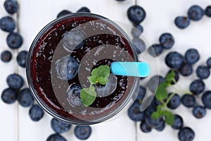 Blueberry smoothie fruit juice milkshake with blueberries fruits
