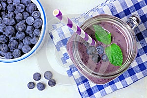 Blueberry smoothie in mason jar glass downward view