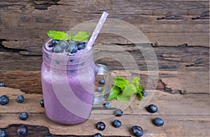 Blueberry smoothie purple colorful fruit juice milkshake blend beverage healthy high protein the taste yummy In glass,drink episod