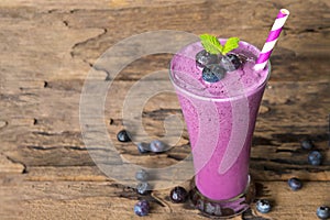 Blueberry smoothie purple colorful fruit juice milkshake blend beverage healthy high protein the taste yummy In glass,drink episod