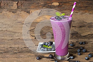 Blueberry smoothie purple colorful fruit juice milkshake blend beverage healthy high protein the taste yummy In glass,drink episod