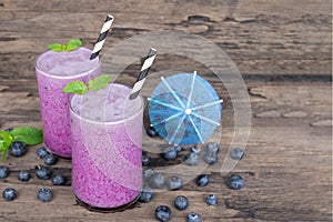 Blueberry smoothies purple colorful fruit juice milkshake blend beverage healthy.