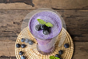 Blueberry smoothiesl fruit juice milkshake blend beverage healthy high protein the taste yummy In glass drink episode