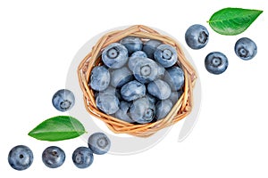 blueberry in wicker basket isolated on white background. Top view. Flat lay.