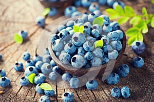 Blueberry on wooden background photo