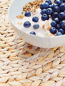 Blueberry yogurt cereal bowl as healthy breakfast and morning meal, sweet food and organic berry fruit, diet and