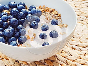 Blueberry yogurt cereal bowl as healthy breakfast and morning meal, sweet food and organic berry fruit, diet and