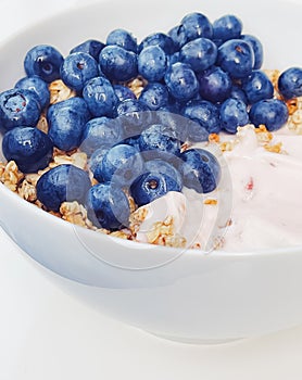 Blueberry yogurt cereal bowl as healthy breakfast and morning meal, sweet food and organic berry fruit, diet and