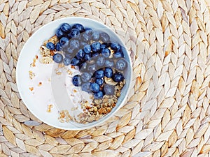 Blueberry yogurt cereal bowl as healthy breakfast and morning meal, sweet food and organic berry fruit, diet and