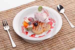 Blueberry yogurt ice cream serve with waffle