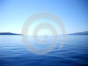 Blueness of sea, sky and pass between Ionian islands