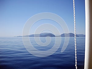 When blueness of seascape meets whiteness of boat