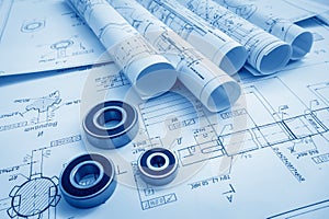 Blueprint rolls and set of construction tools