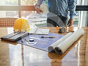 Blueprint on wooden desk