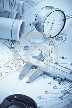Blueprints with measuring instruments