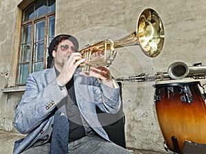 Blues musician test the trumpet