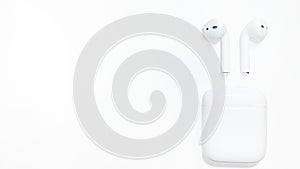 Bluetooth white headphones isolated on white background in banner format. Gadgets and electronic devices