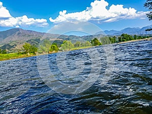 Bluewater river mountain cloudy sky