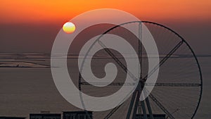 Bluewaters island at sunset aerial timelapse with ferris wheel