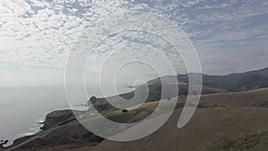 Bluffs overlooking the pacific ocean in sanoma county california panning inland