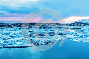 Bluish Icebergs floating on beautiful Jokulsarlon lagoon Iceland