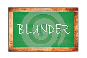 BLUNDER text written on green school board photo