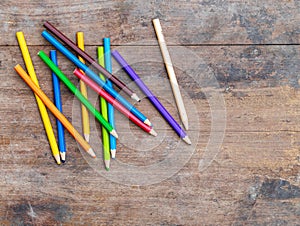 blunt coloured pencils on wood