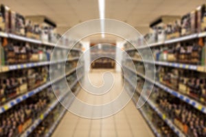 Blur abstract background of people shopping in super market ,products on shelves ,Supermarket with bokeh,customer