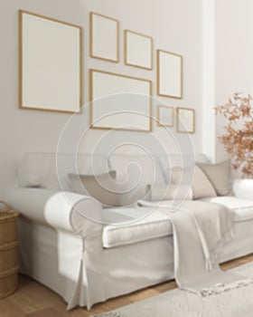 Blur background, frame mockup, wooden scandinavian living room close up, white sofa, pillows and blanket, carpet, potted plants