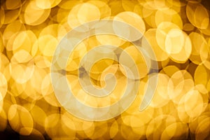 Blur background of gold color bokeh light