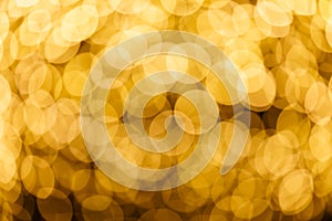 Blur background of gold color bokeh light