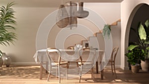 Blur background interior design, vintage retro dining room with table and chairs, breakfast buffet, classic pendant lamps,