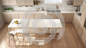 Blur background interior design, white kitchen with wooden details and parquet floor, modern pendant lamps, minimalist concept