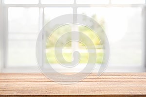 Blur background of white window glass and green view from garden