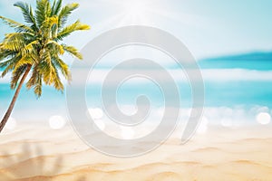 Blur beautiful nature green palm leaf on tropical beach with bokeh sun light wave abstract background