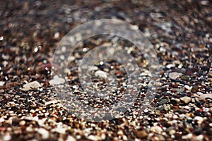 The blur bottom of the sea with clear water, the pebble stones