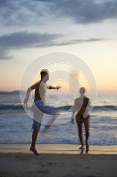 Blur of Brazilians Playing Altinho Futebol Beach Football