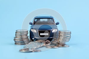 Blur Car SUV on coins background : Car loan, Finance, saving money, insurance and leasing time concepts