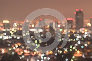 Blur city background rooftop view of Bangkok cityscape business building landscape night lights bokeh