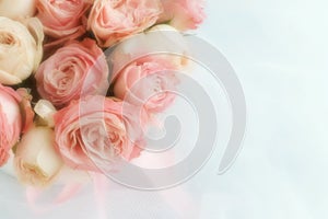 Blur effect, soft focus flowers background with bouquet of pale pink roses photo