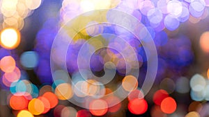 blur focused city night light filtered bokeh abstract background.de focus Decorative lights of the city during the festival
