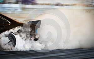 Blur image of car drifting on race track