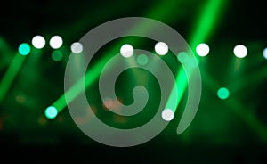 Blur image of green stage lights background