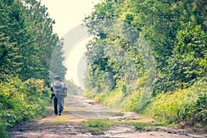 Blur image Group friend walking in the wild with a heavy backpack. Travel Lifestyle wanderlust adventure concept summer vacations