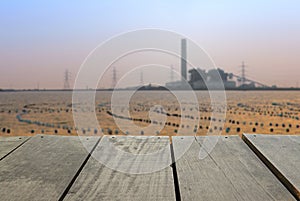 Blur image of terrace wood and Coal-Fired Power Plant